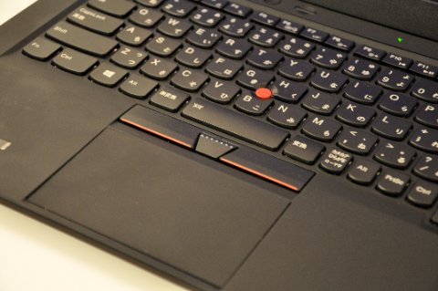 Laptop keyboard with integrated touchpad below showing precision pointing device layout