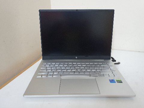 HP Envy laptop on desk during BIOS firmware recovery and hard reset procedure HP Envy laptop on desk during BIOS firmware recovery and hard reset procedure