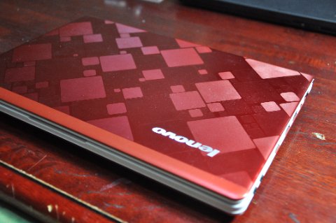 Lenovo IdeaPad laptop on desk with lid open ready for BIOS configuration Lenovo IdeaPad laptop on desk with lid open ready for BIOS configuration