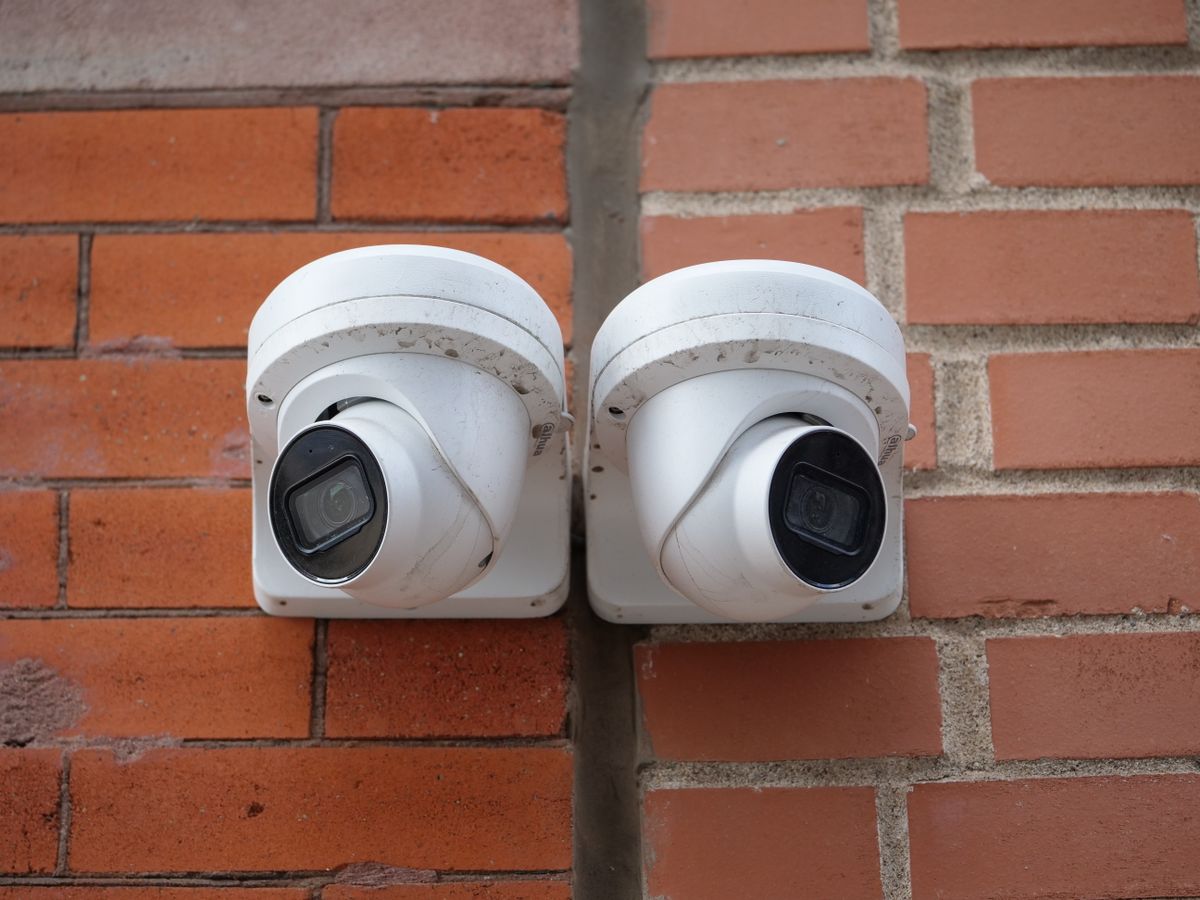 Dual wired CCTV cameras mounted on a wall for Imou NVR kit setup Dual wired CCTV cameras mounted on a wall for Imou NVR kit setup