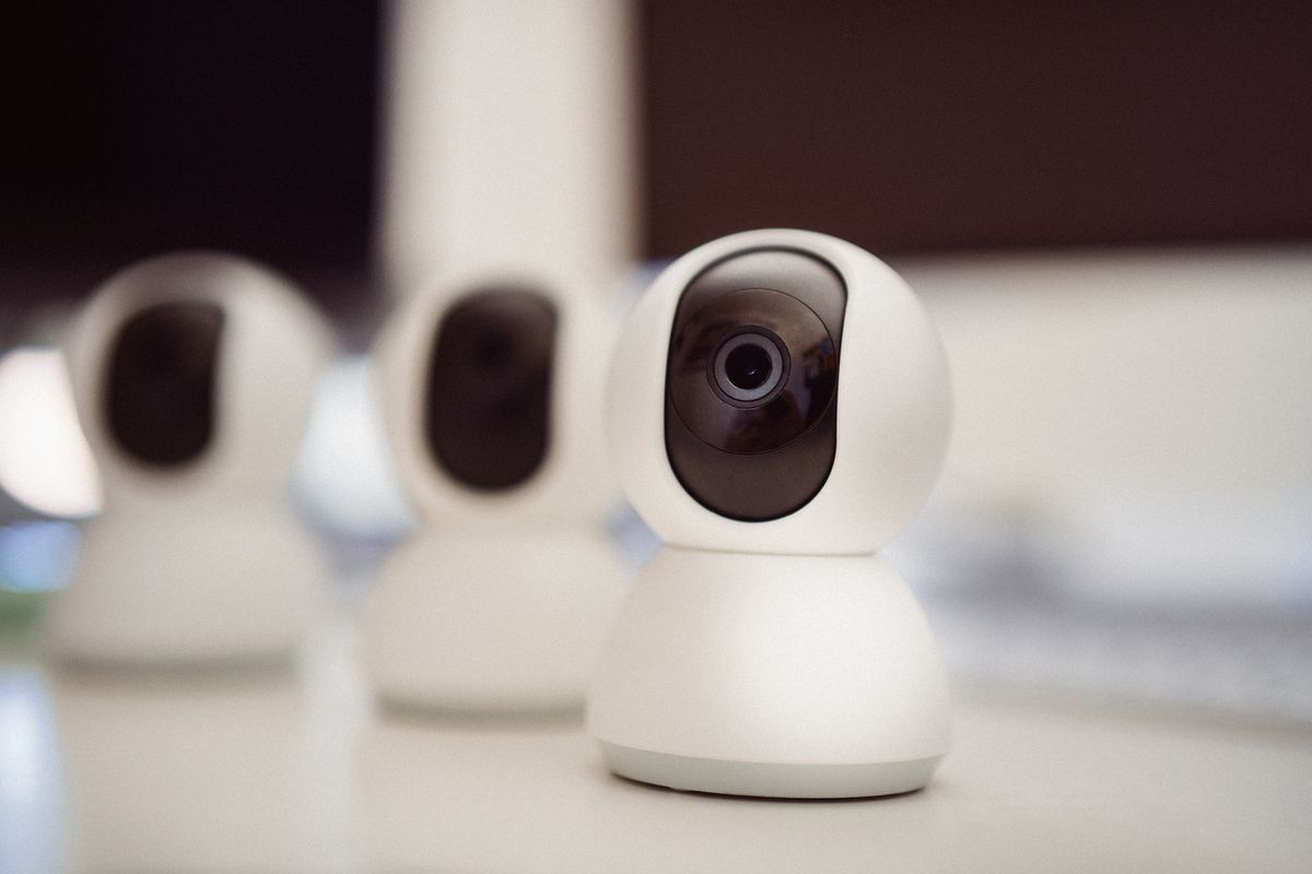 Pan tilt WiFi cameras lined up before Imou Life app pairing setup Pan tilt WiFi cameras lined up before Imou Life app pairing setup