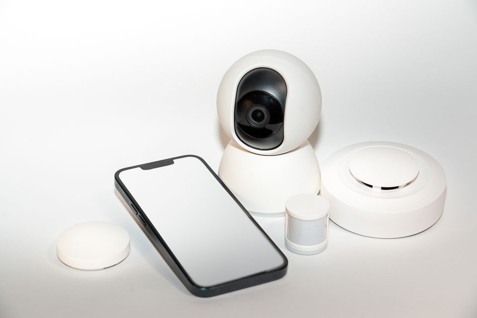 Smart home security devices paired with a smartphone for Imou Life setup Smart home security devices paired with a smartphone for Imou Life setup