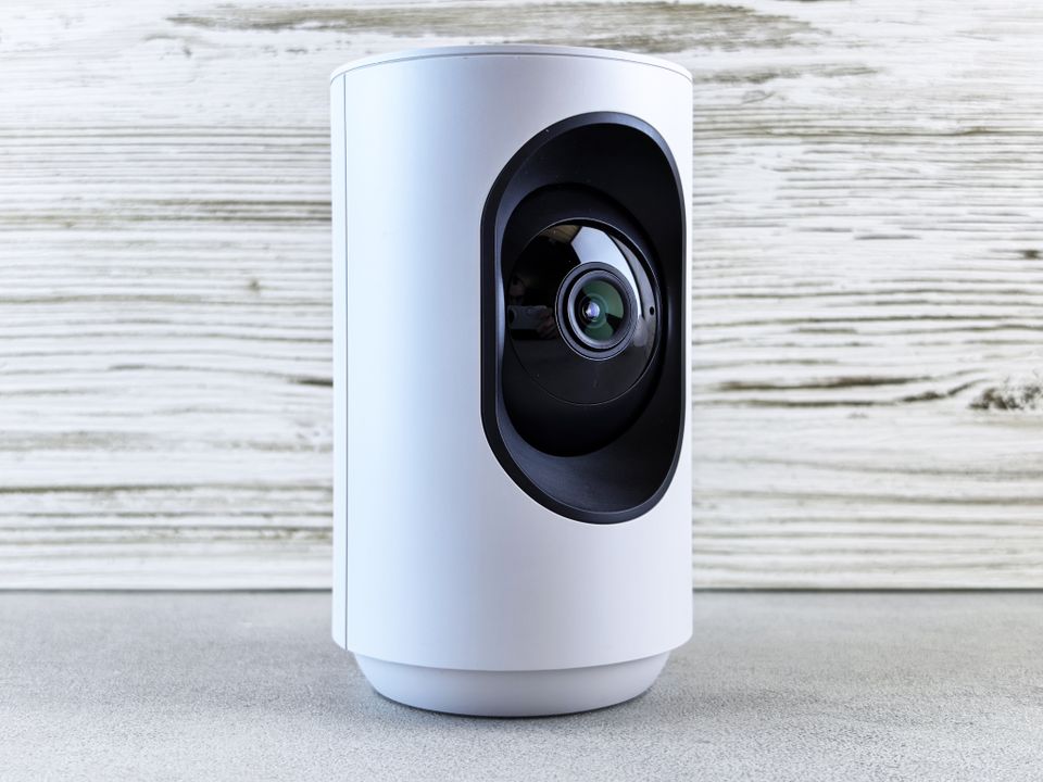 White indoor security camera representing the Imou Life app setup White indoor security camera representing the Imou Life app setup