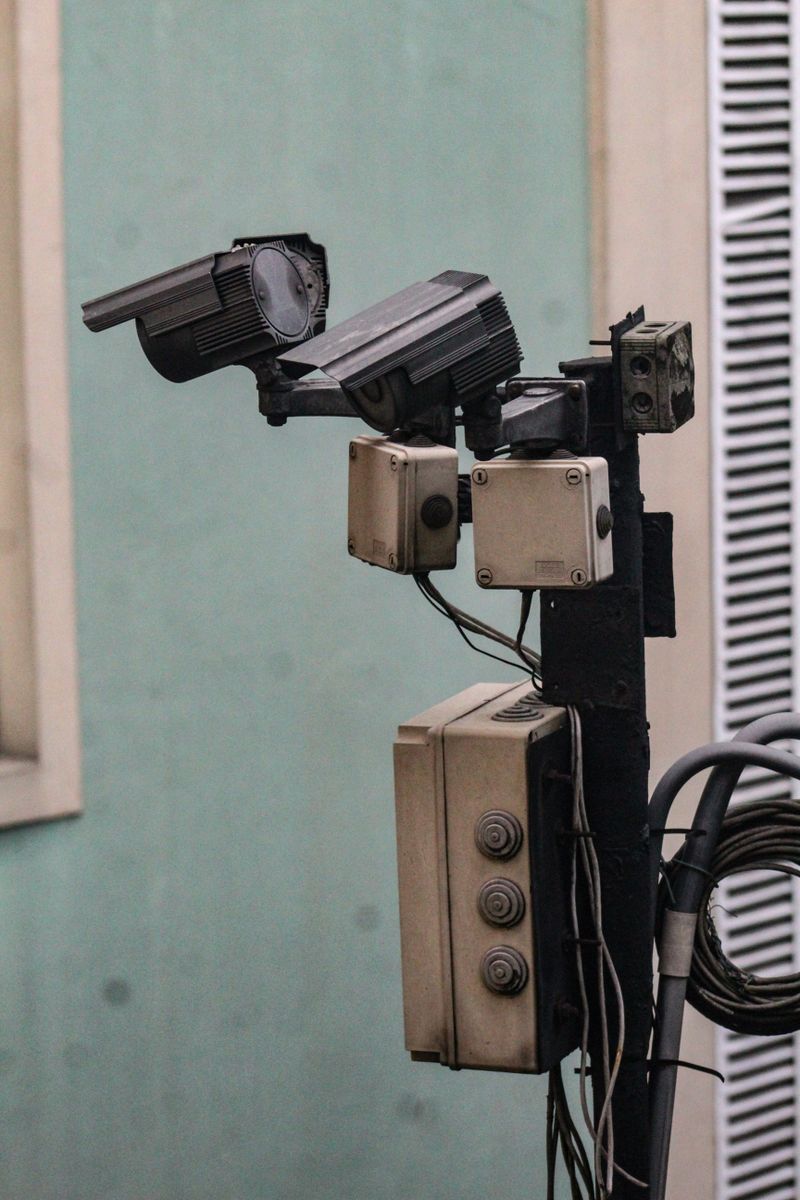 Wired security cameras mounted outdoors demonstrating ONVIF compatible NVR camera setup Wired security cameras mounted outdoors demonstrating ONVIF compatible NVR camera setup